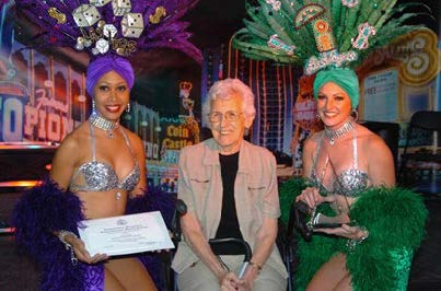 Betty Willis with showgirls, at the “50 Years of Fabulous Neon” Bill Hanapple photo exhibit.
From the Las Vegas Sun, photo by Bob Brye,
Las Vegas News Bureau